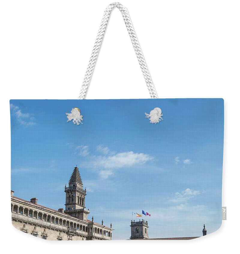 Obradoiro Weekender Tote Bag featuring the photograph old town Obradoiro Square near santiago de compostela cathedral #3 by JM Travel Photography