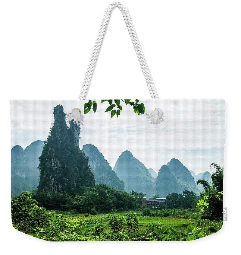 Karst Weekender Tote Bag featuring the photograph Karst mountains and rural scenery #30 by Carl Ning