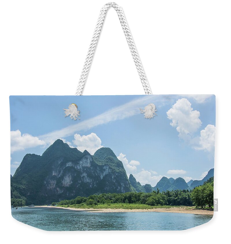 River Weekender Tote Bag featuring the photograph Lijiang River and karst mountains scenery #31 by Carl Ning