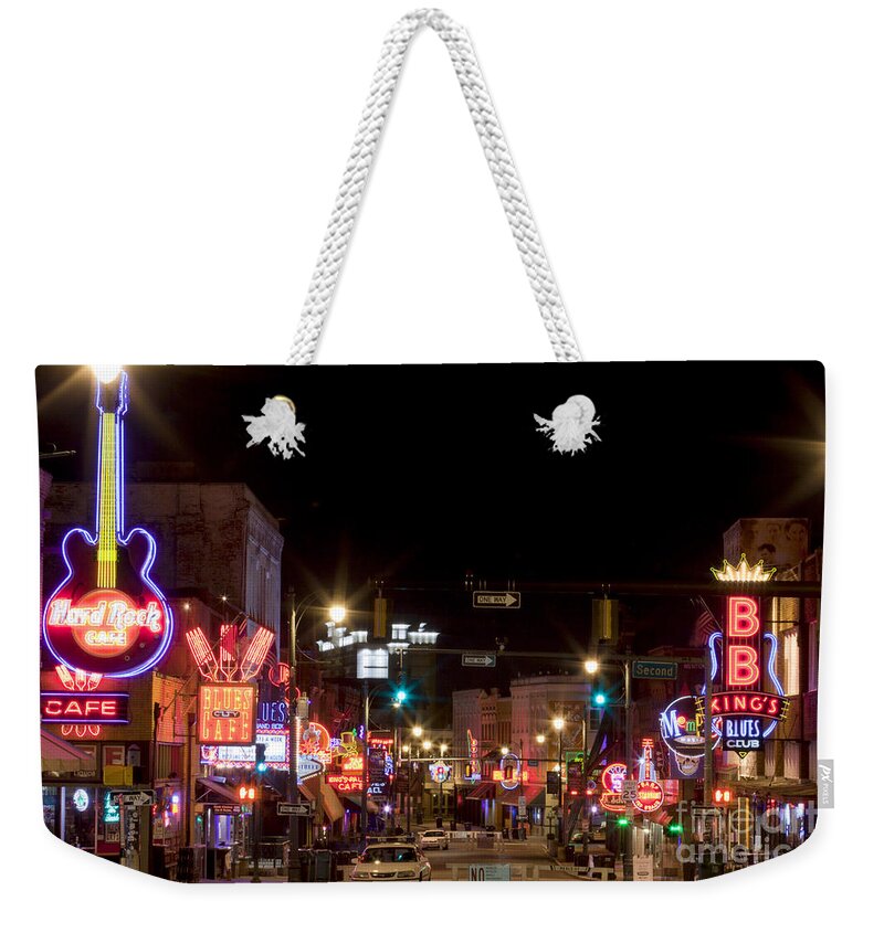 Memphis Weekender Tote Bag featuring the photograph Beale Street in Downtown Memphis Tennessee #4 by Anthony Totah