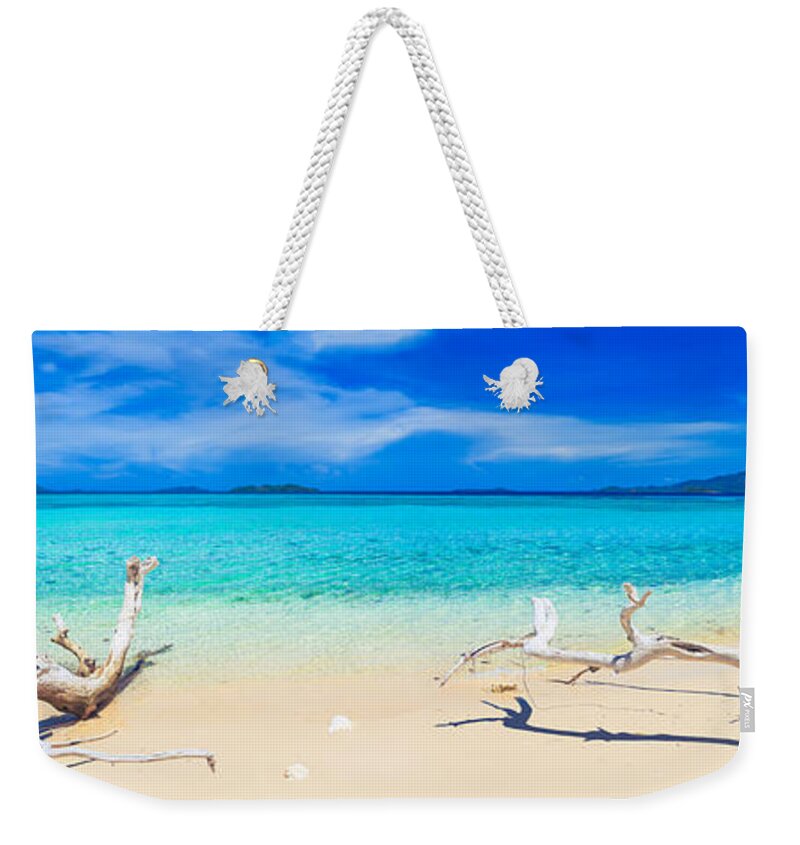 Sea Weekender Tote Bag featuring the photograph Tropical beach Malcapuya by MotHaiBaPhoto Prints