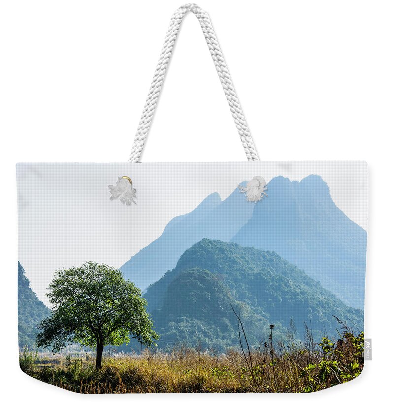 The Karst Mountains Scenery In Winter Weekender Tote Bag featuring the photograph Karst mountains scenery in winter #5 by Carl Ning