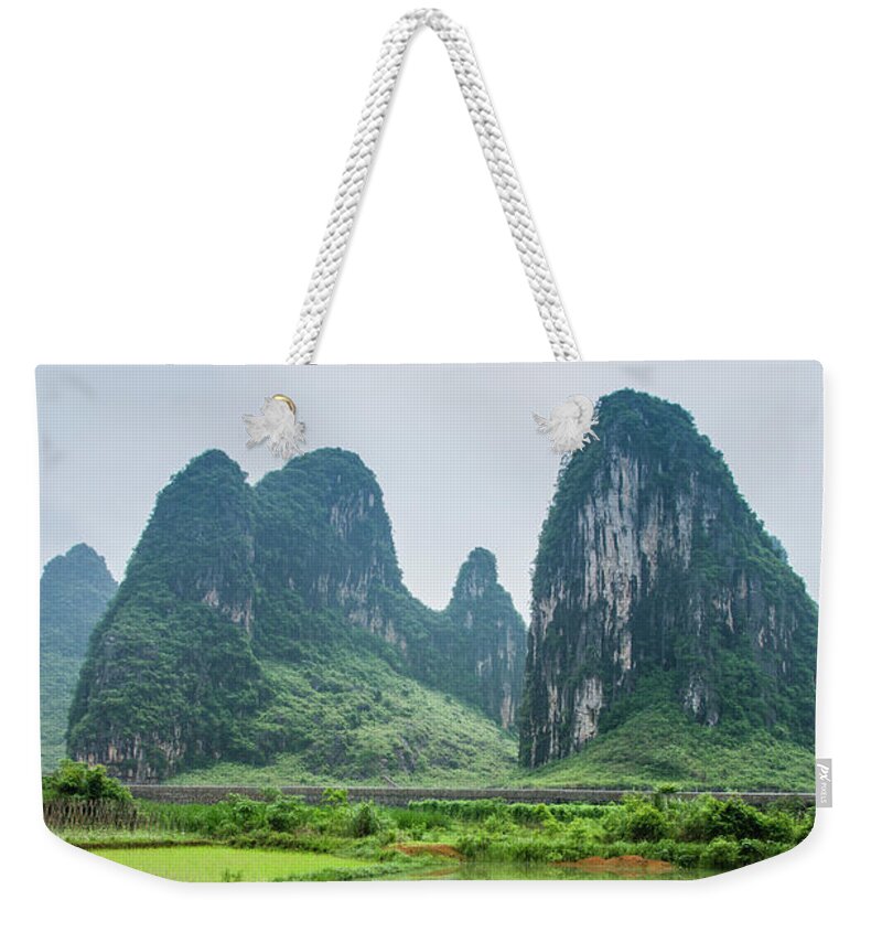 Landscape Weekender Tote Bag featuring the photograph The beautiful karst rural scenery in spring #50 by Carl Ning