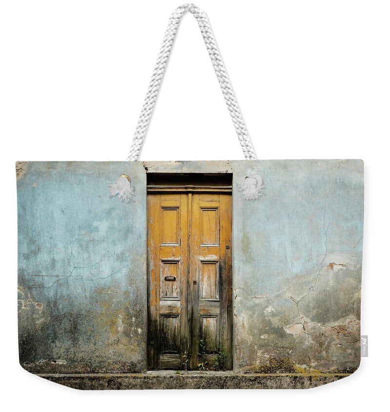 Street Weekender Tote Bag featuring the photograph Door With No Number #6 by Marco Oliveira