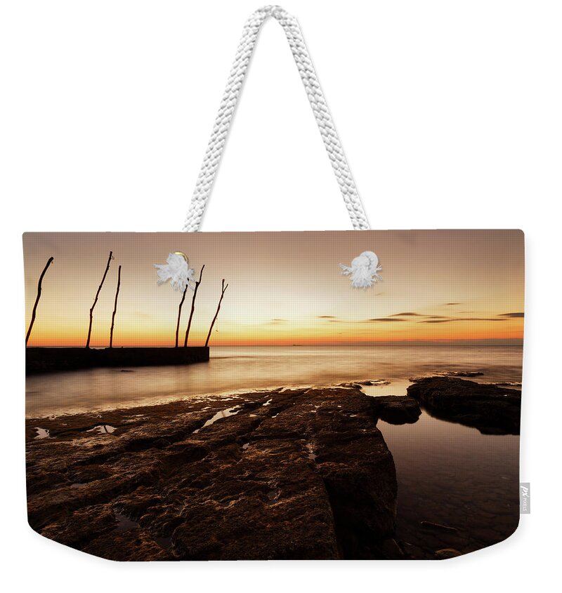 Ba�anija Weekender Tote Bag featuring the photograph Sunset at basanija by Ian Middleton