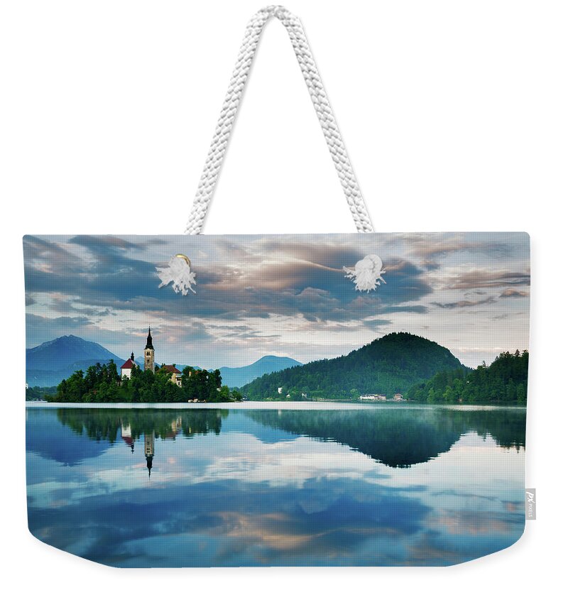 Bled Weekender Tote Bag featuring the photograph Sunset over Lake Bled #6 by Ian Middleton