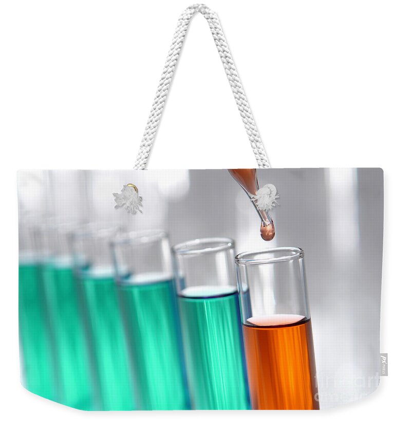 Chemistry Weekender Tote Bag featuring the photograph Test Tubes in Science Research Lab #64 by Olivier Le Queinec