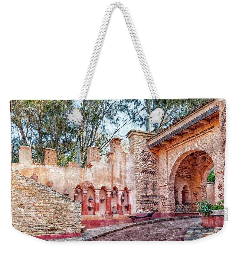 Africa Weekender Tote Bag featuring the photograph In the medina of the african harbor city Agadir in Morocco #7 by Gina Koch