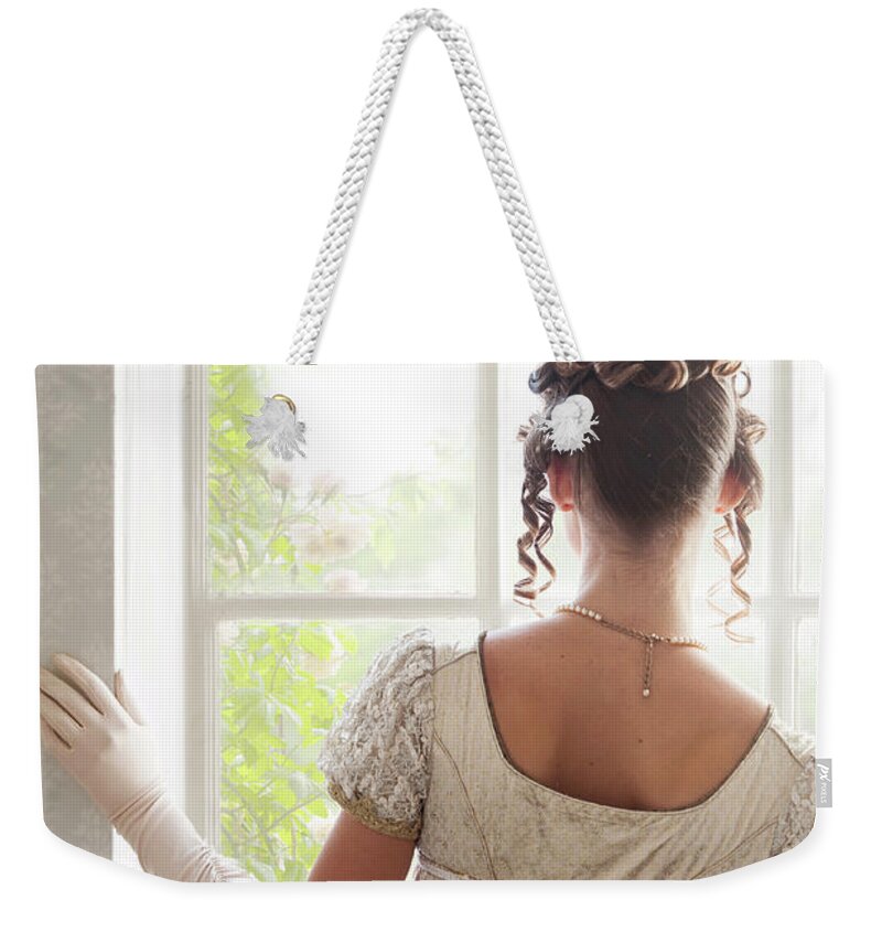 Regency Weekender Tote Bag featuring the photograph Regency Woman At The Window #7 by Lee Avison