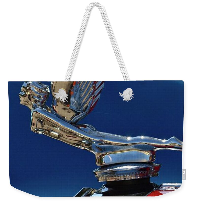  Weekender Tote Bag featuring the photograph Hood Ornament by Dean Ferreira