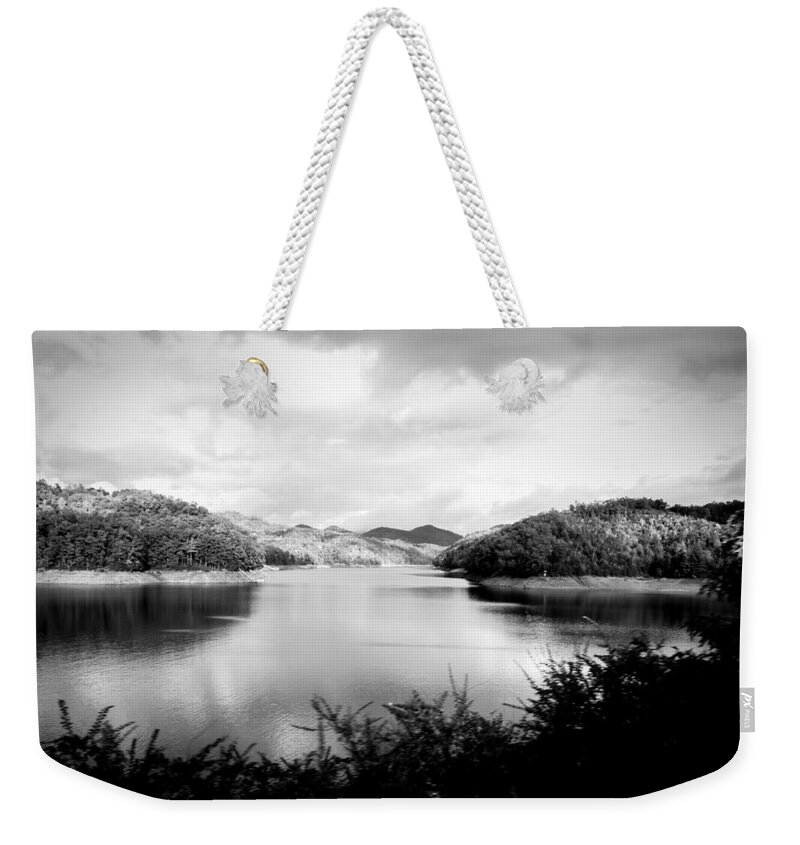 Kelly Hazel Weekender Tote Bag featuring the photograph A Black and White Landscape on the Nantahala River by Kelly Hazel