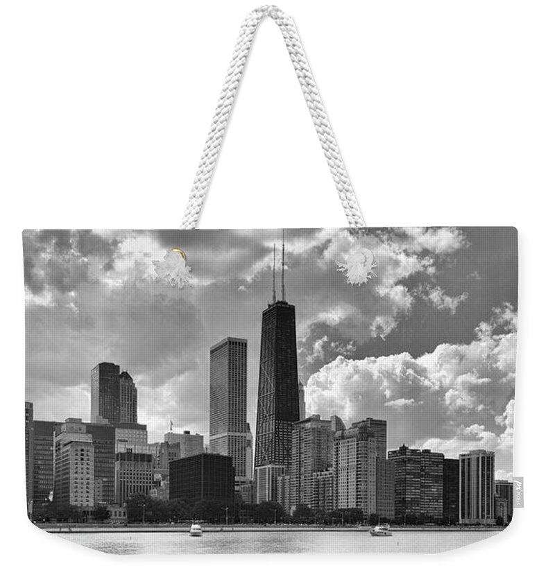 Chicago Weekender Tote Bag featuring the photograph A Chicago Skyline by John Roach