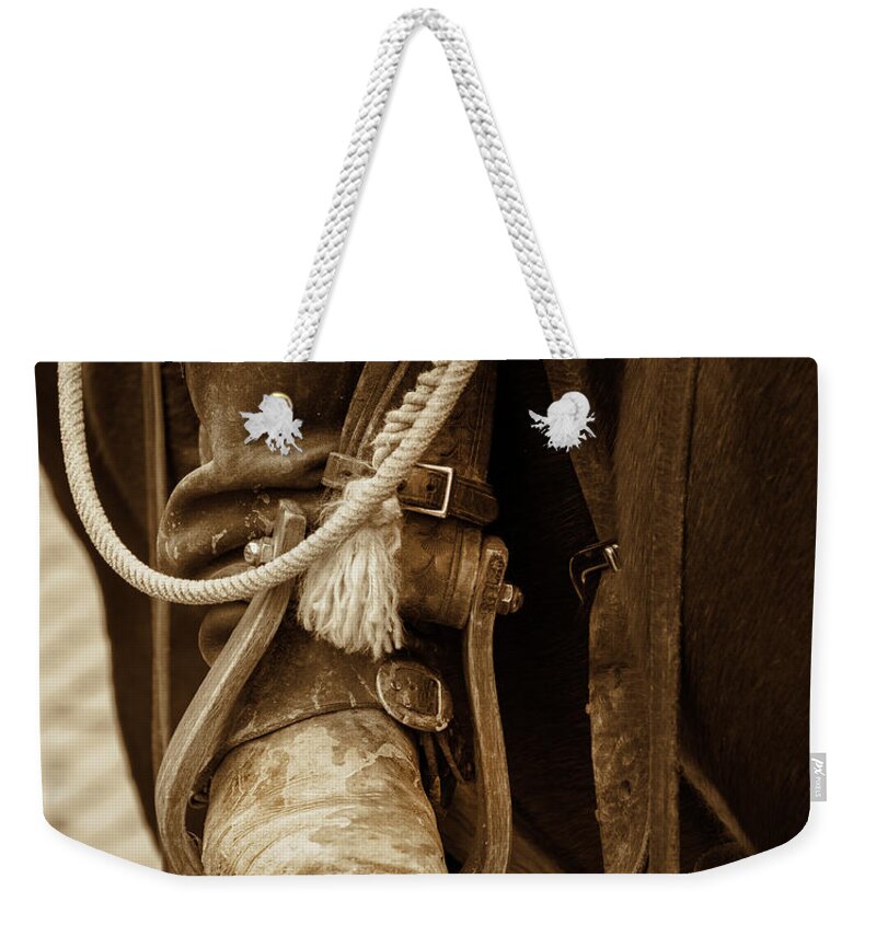 Cowboy Weekender Tote Bag featuring the photograph A Cowboy's Boot by Jeanne May