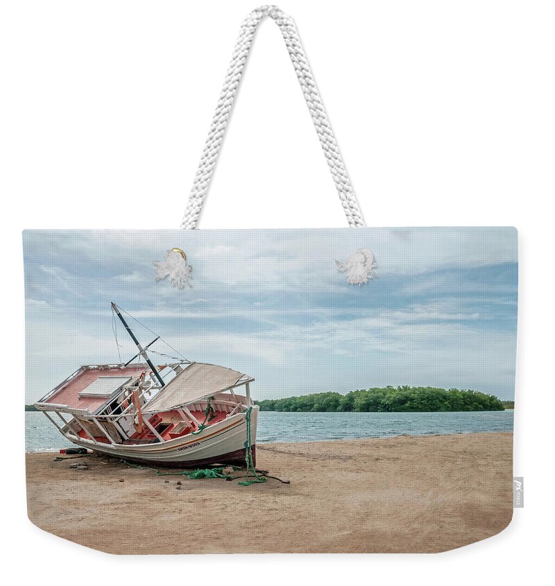 Trinidad And Tobago Weekender Tote Bag featuring the photograph A day of fishing aground by Wilfredo R Rodriguez
