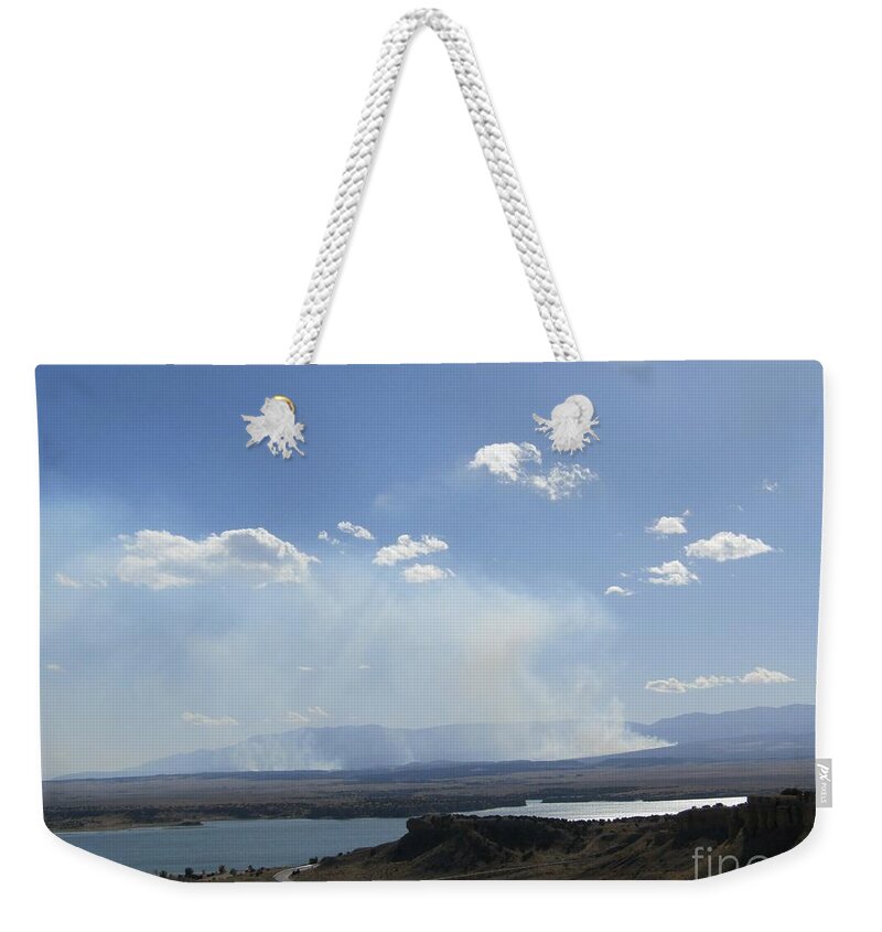  Weekender Tote Bag featuring the photograph A Freak Event by Kelly Awad