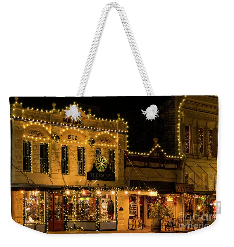 Georgetown Weekender Tote Bag featuring the photograph A Little Wine and Shopping in Georgetown Texas by Bob Phillips