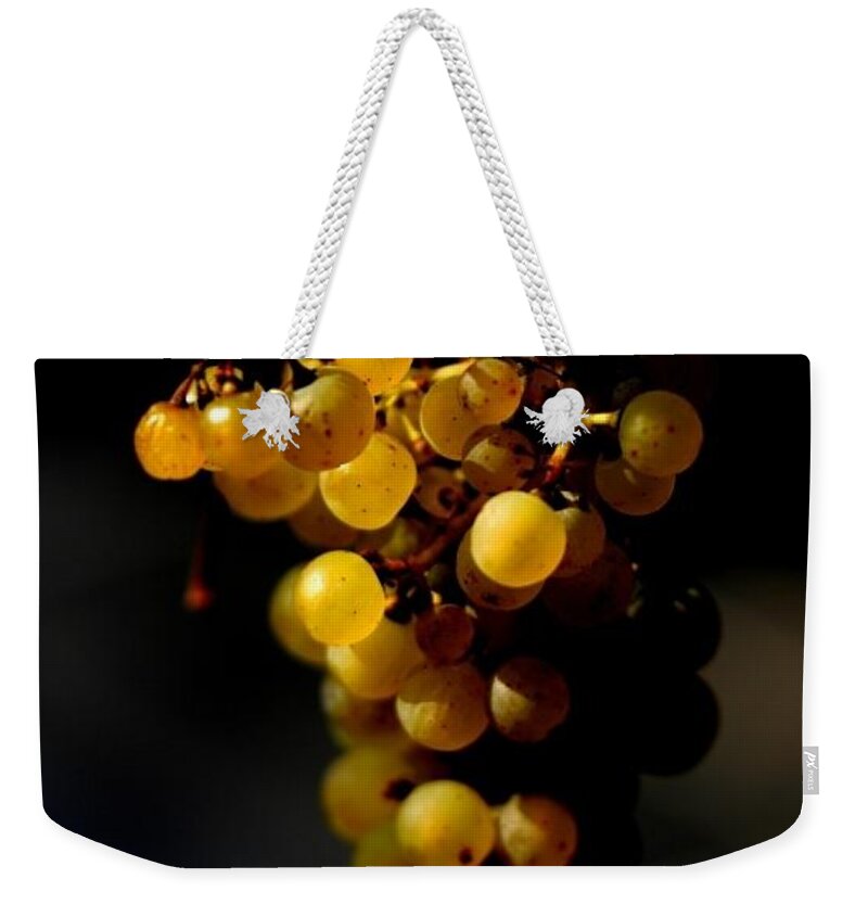 Grapes Lighting Food Wine Autumn Growth Life Icewine Weekender Tote Bag featuring the photograph A luscious bunch of grapes by Ian Sanders