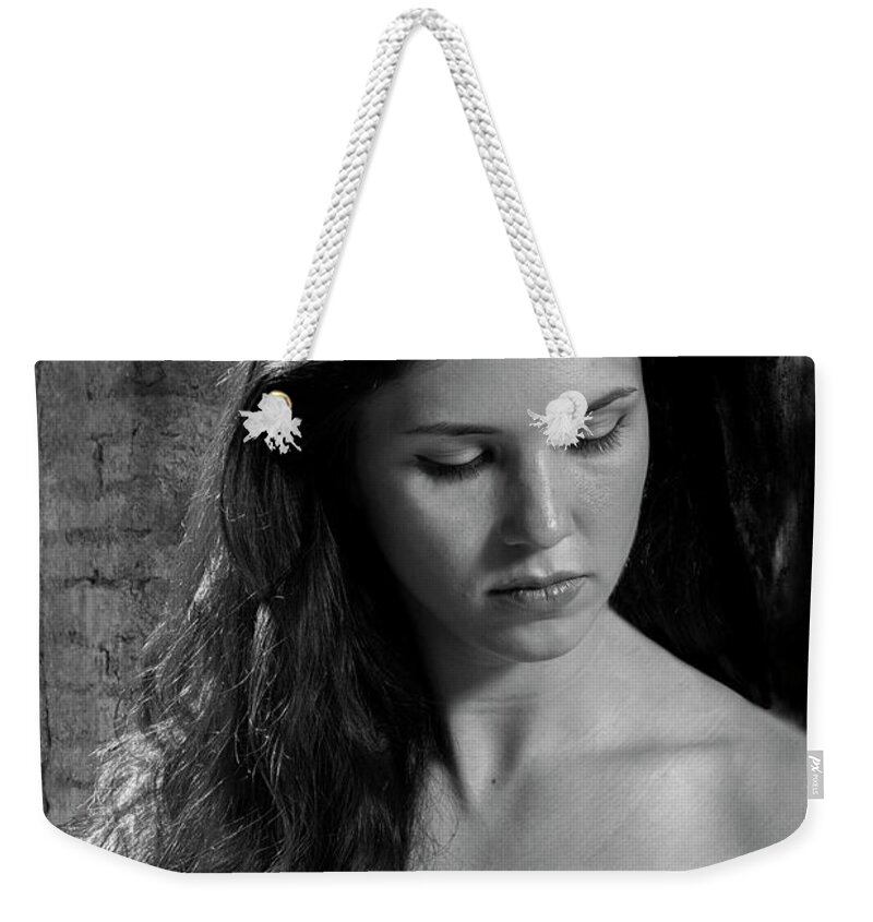 Spanish Weekender Tote Bag featuring the photograph a Moment by Robert Och