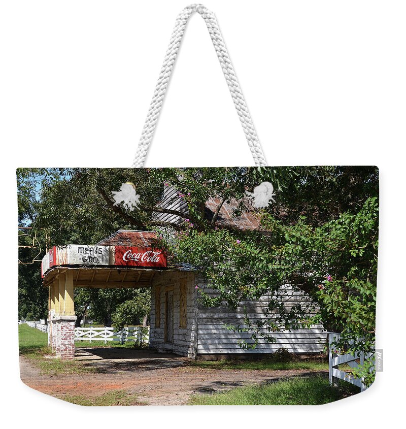 Store Weekender Tote Bag featuring the photograph A Piece of the Past by Linda Brown