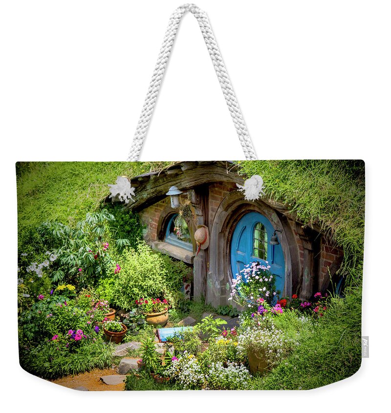 Hobbits Weekender Tote Bag featuring the photograph A Pretty Hobbit Hole by Kathryn McBride
