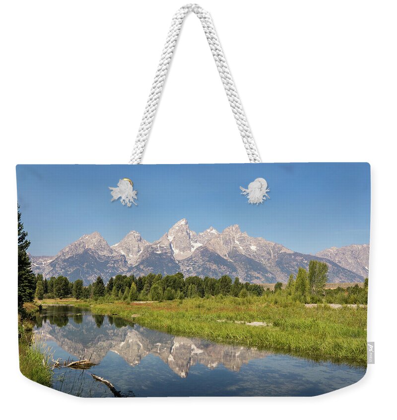 Photosbymch Weekender Tote Bag featuring the photograph A Reflection of the Tetons by M C Hood