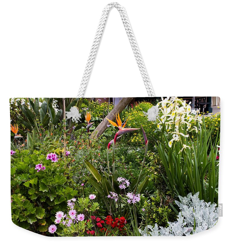 Lisbon Weekender Tote Bag featuring the photograph A Riot of Flowers by Lorraine Devon Wilke