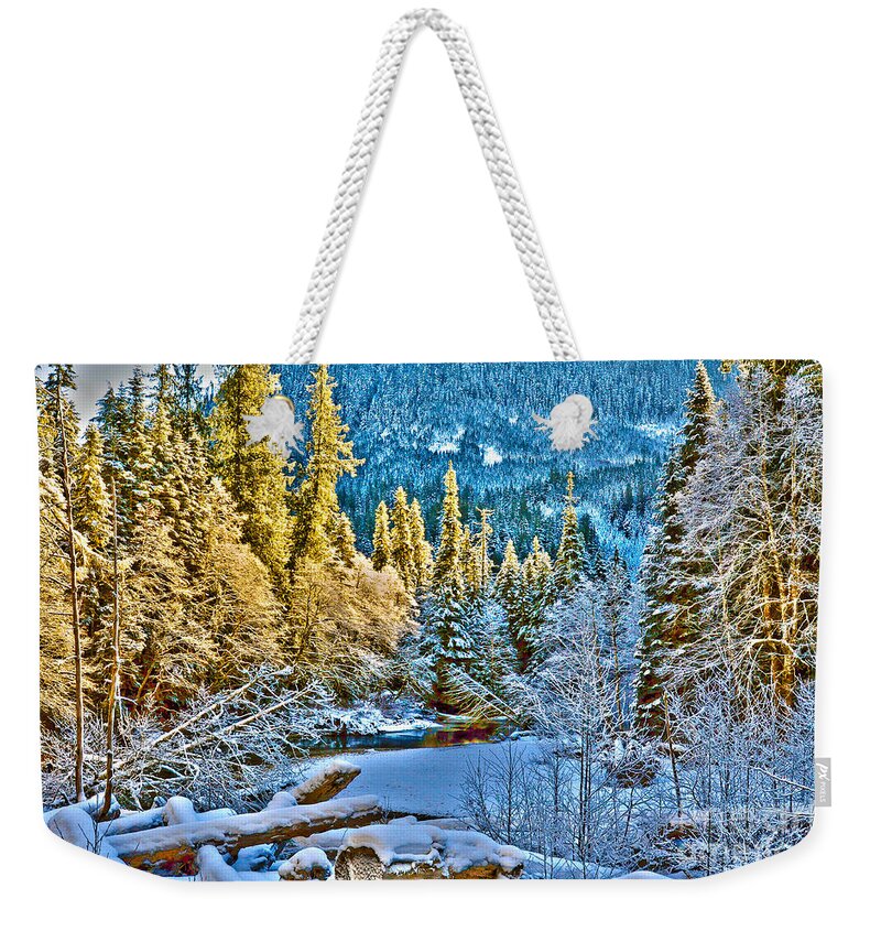 Clay Weekender Tote Bag featuring the photograph A River Runs Down It by Clayton Bruster