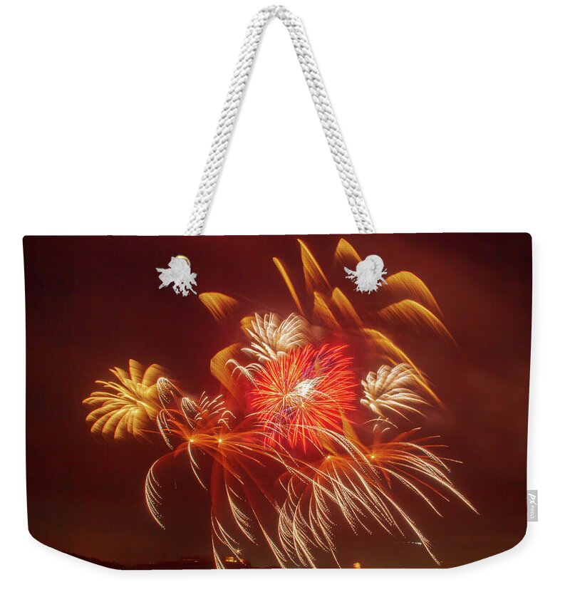A Spash Of Fireworks Weekender Tote Bag featuring the photograph A Splash of Fireworks by Bonnie Follett