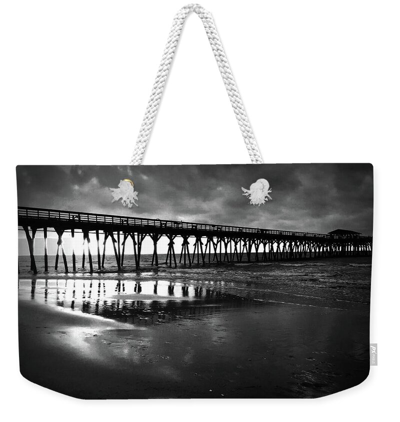 Kelly Hazel Weekender Tote Bag featuring the photograph A Storm at Sunrise by Kelly Hazel