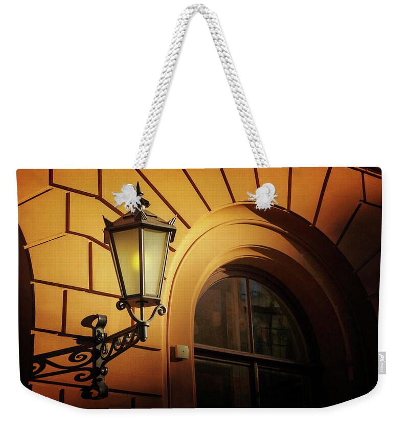 Street Lamp Weekender Tote Bag featuring the photograph A Street Lamp in Lisbon Portugal by Carol Japp