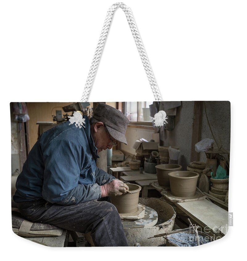 Pottery Weekender Tote Bag featuring the photograph A Village Pottery Studio, Japan by Perry Rodriguez