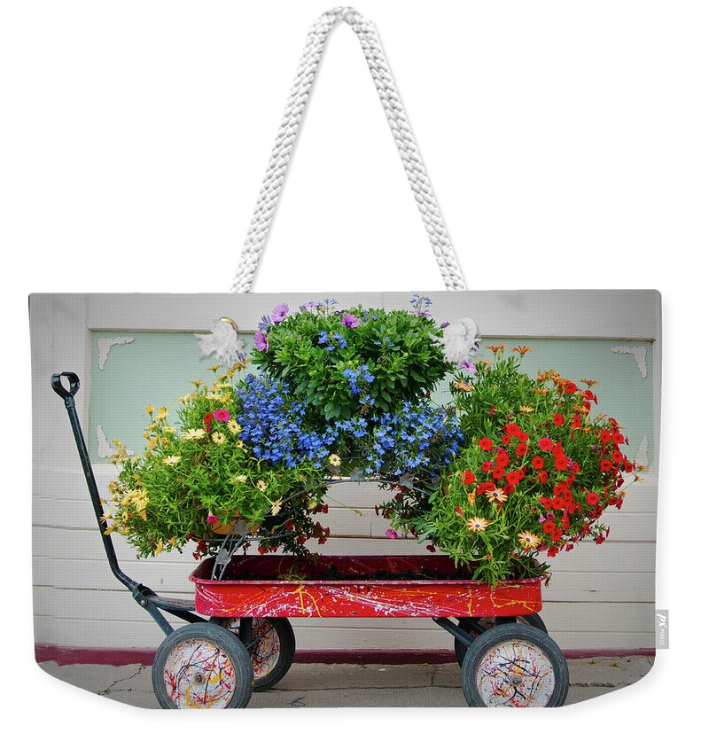 Wagon Weekender Tote Bag featuring the photograph A Wagon Full by Peggy Dietz