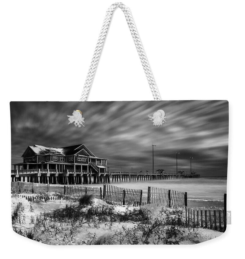 Jannettes Pier Weekender Tote Bag featuring the photograph A Winters Dusting black and white by C Renee Martin