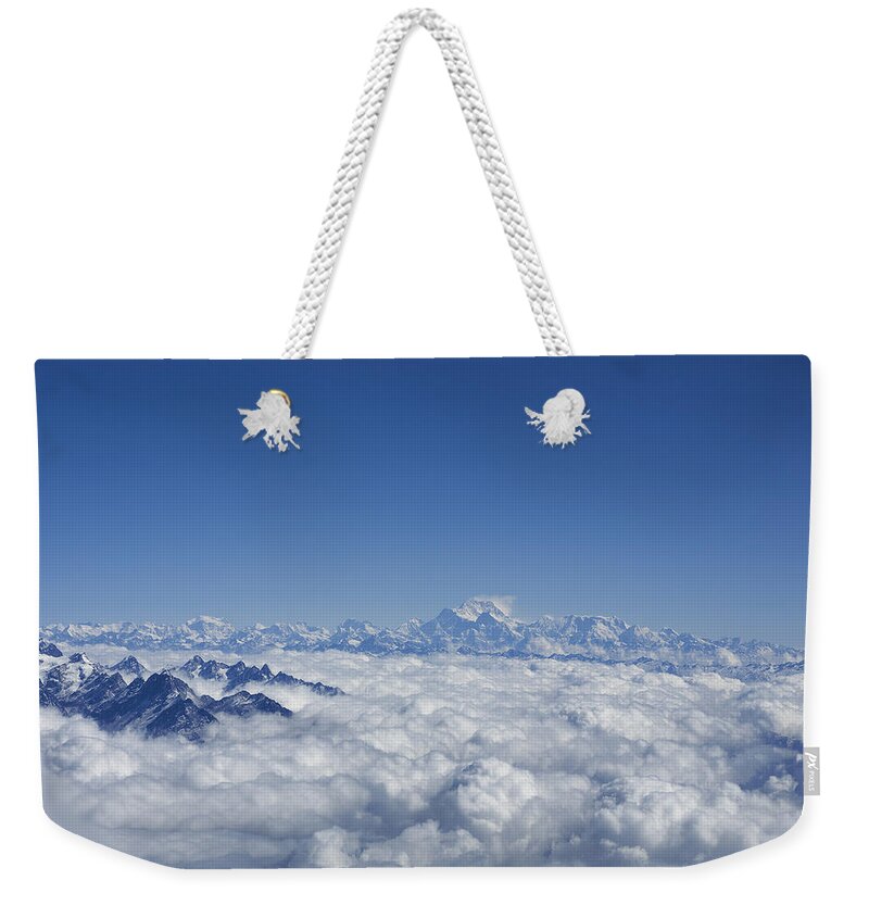 Everest Weekender Tote Bag featuring the photograph Above the clouds by Ivan Slosar