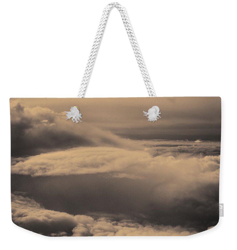 Above The Clouds Weekender Tote Bag featuring the photograph Above the clouds by Peter V Quenter
