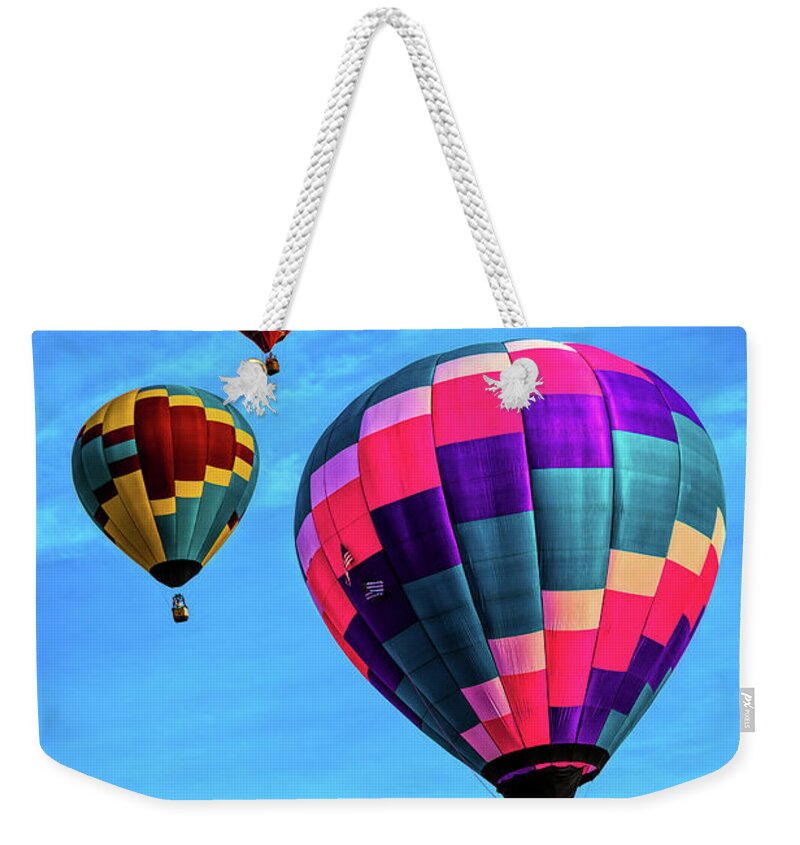 Jon Burch Weekender Tote Bag featuring the photograph Above The Crowd by Jon Burch Photography