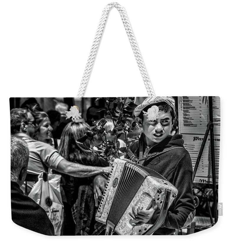  Weekender Tote Bag featuring the photograph Accordion Player by Patrick Boening