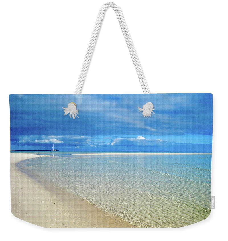 Beach Weekender Tote Bag featuring the photograph ADAGIO alone in Ouvea, South Pacific by Dorothy Darden