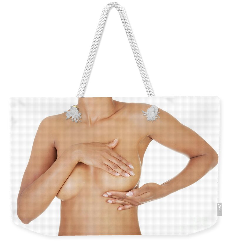 Adult woman examining her breast Weekender Tote Bag