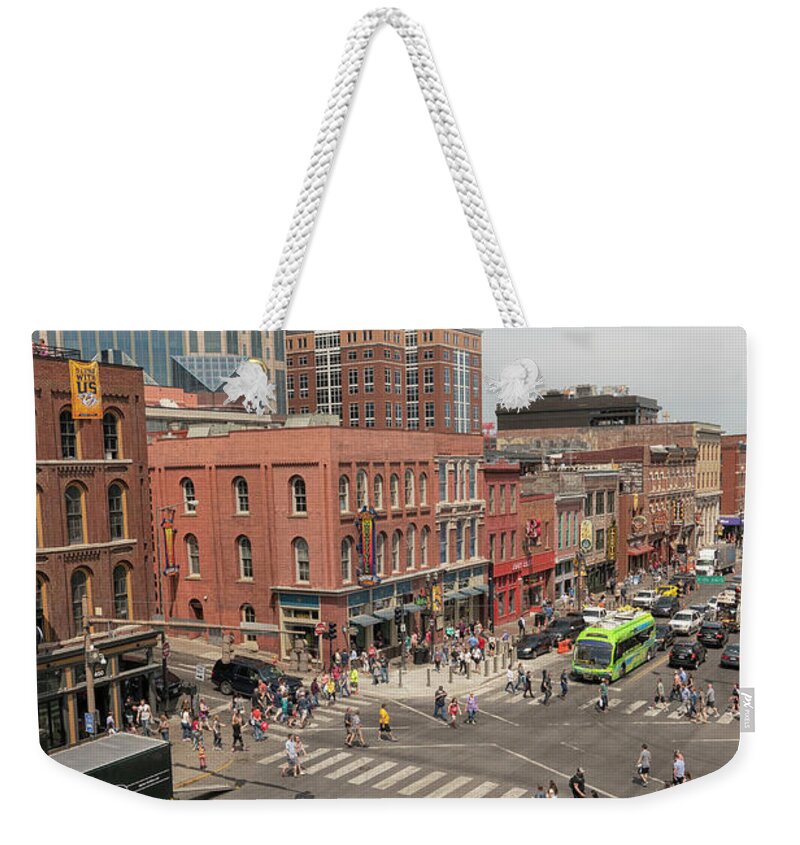 Nashville Weekender Tote Bag featuring the photograph Aerial view on Broadway, Nashville by Patricia Hofmeester