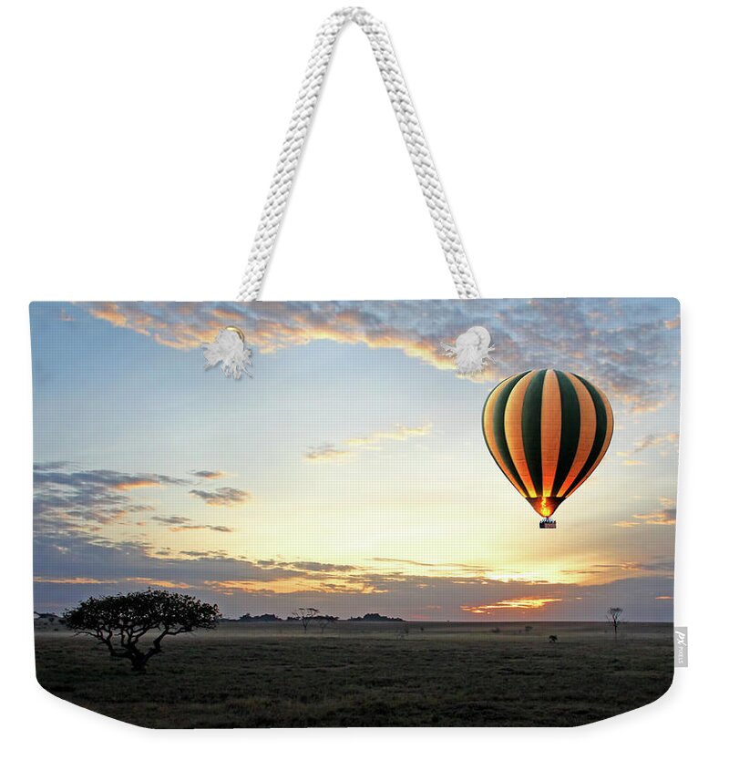 African Landscape Weekender Tote Bag featuring the photograph African Dawn With Hot Air Balloon by Gill Billington