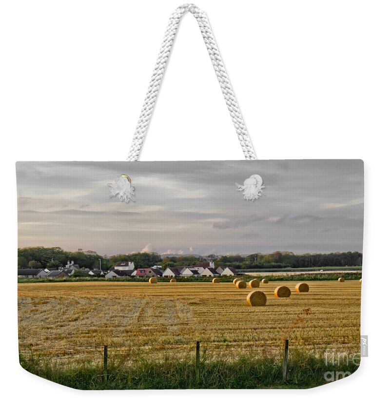 Evening Landscape Weekender Tote Bag featuring the photograph After harvest. by Elena Perelman