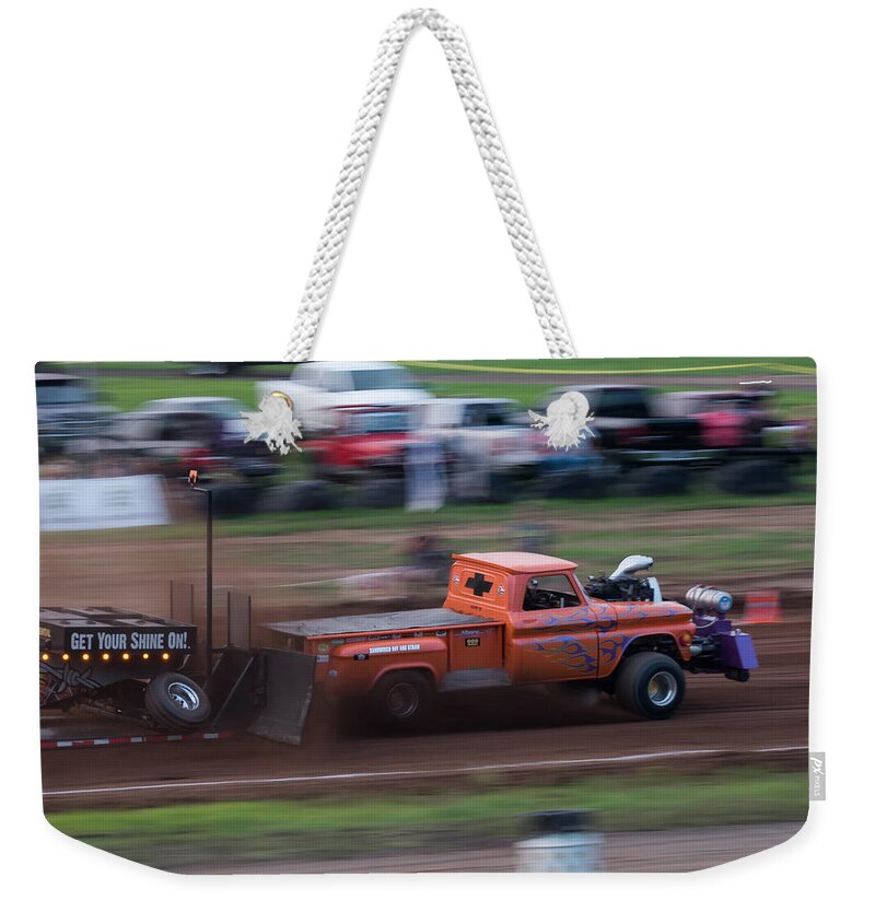 After Hours Weekender Tote Bag featuring the photograph After Hours by Holden The Moment