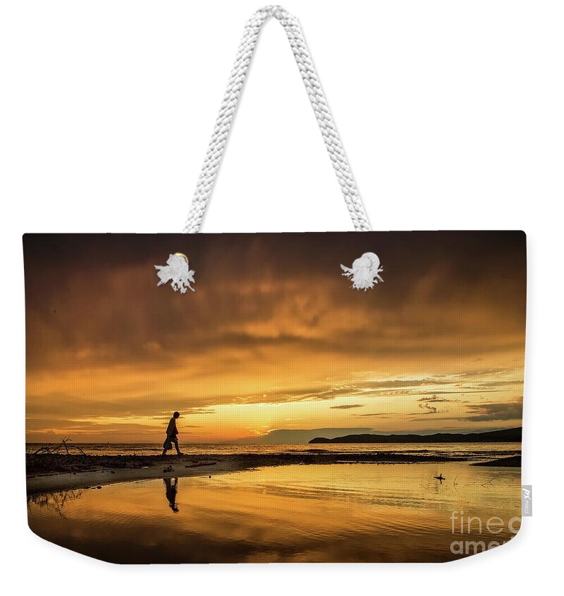 Sunset Weekender Tote Bag featuring the photograph After the storm by Daliana Pacuraru