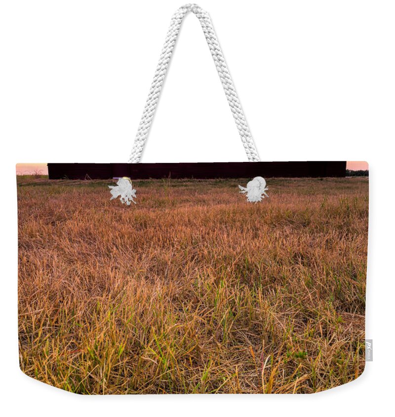 Aggie Barn Weekender Tote Bag featuring the photograph Aggie land by Jonathan Davison