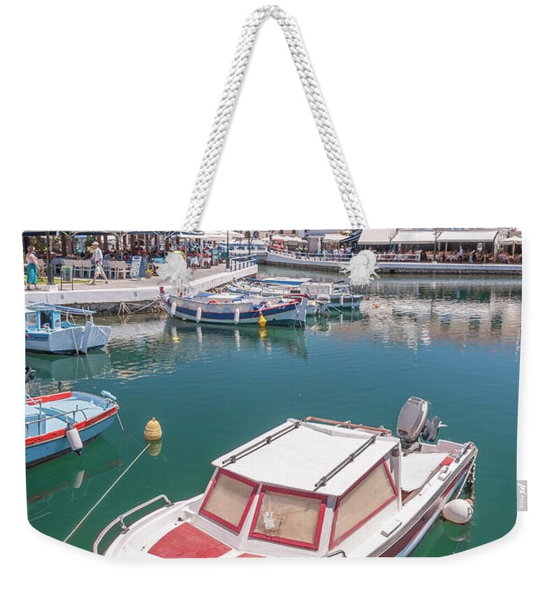 Greece Weekender Tote Bag featuring the photograph Agios Nikolaos Boat in Lagoon by Antony McAulay