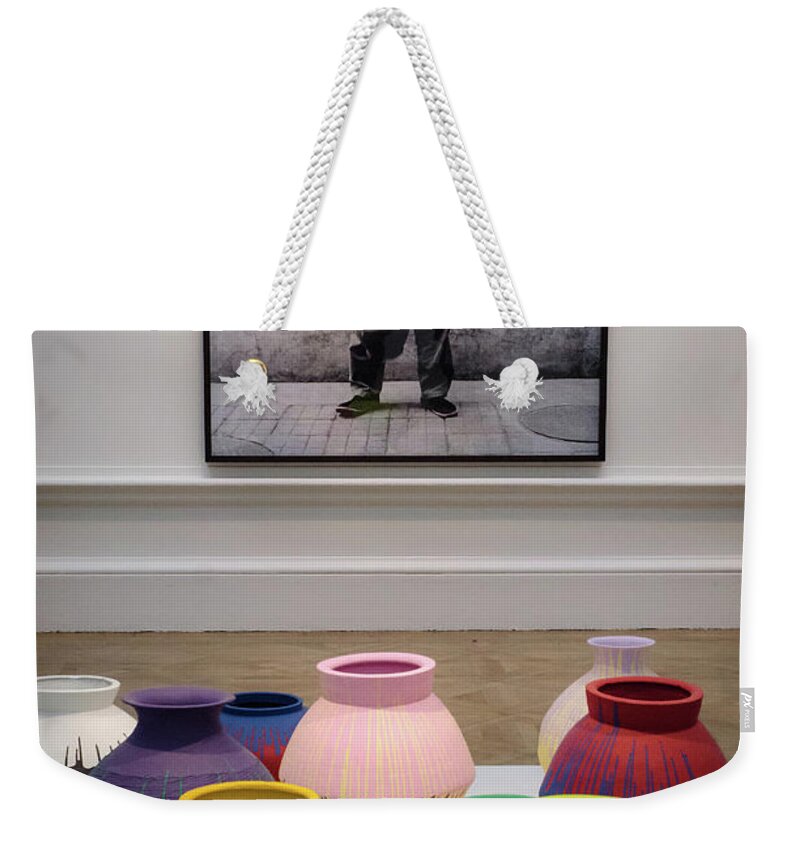 Ai Weiwei Weekender Tote Bag featuring the photograph Ai Weiwei, Portrait and Vases by Perry Rodriguez