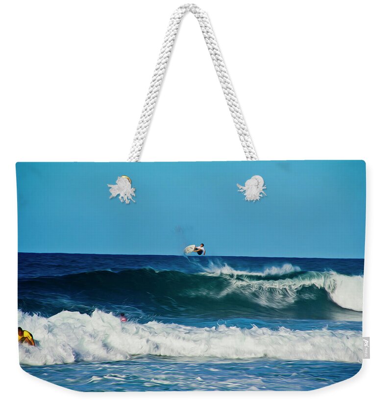 Surfing Weekender Tote Bag featuring the photograph Air bourne by Stuart Manning