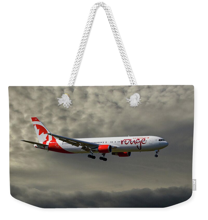 Air Canada Weekender Tote Bag featuring the photograph Air Canada Rouge Boeing 767-35H by Smart Aviation
