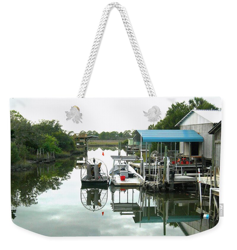Airboat Weekender Tote Bag featuring the photograph Airboat Fishing for a Living by Deborah Ferree